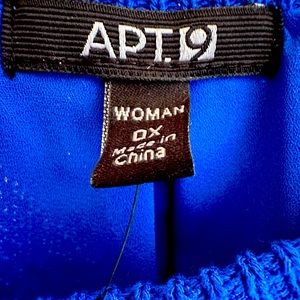 Royal blue sleeveless blouse, with accent opening in the back, NEW with Tags